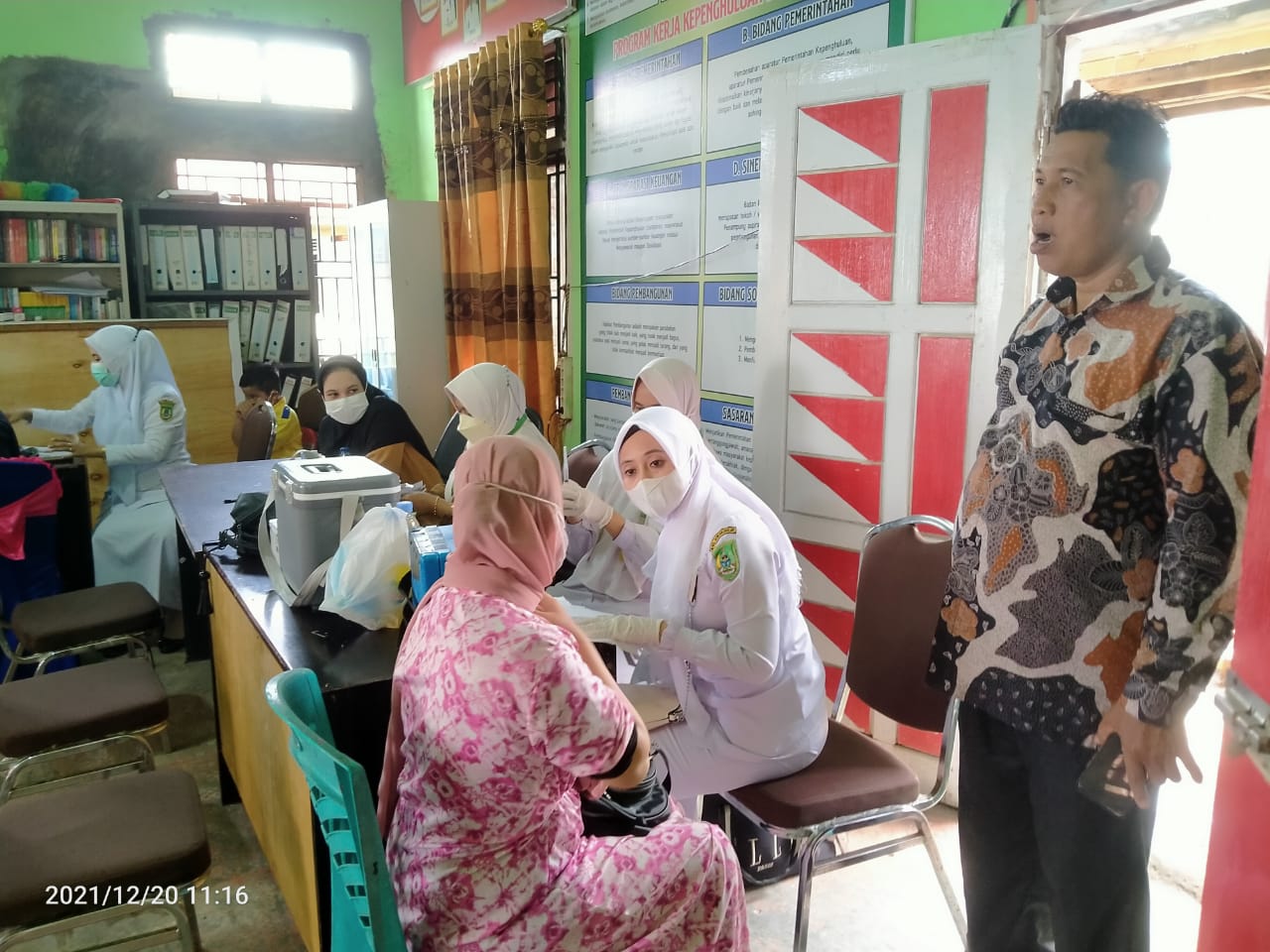 Berbondong- bondong, Warga Kepenghuluan Baganjawa Antusias Ikuti Vaksinasi Massal