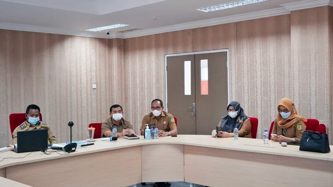 Wabup Rohil Vidcon Dengan Kapolres Evaluasi Percepatan Vaksin